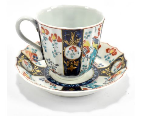 WORCESTER; an 18th century first period large ribbed cup and saucer, (upright shape), decorated in the 'Joshua Reynolds' patt