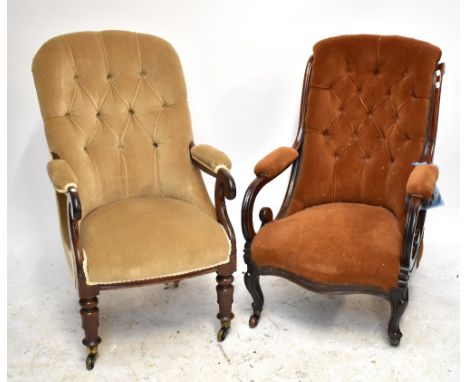 Two Victorian armchairs, each upholstered with button back material.