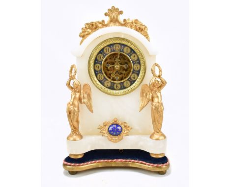 A late 19th century French alabaster and gilt metal eight day mantel clock, the circular chapter ring set with Arabic numeral