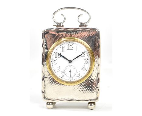 A George V hallmarked silver cased travel clock, the circular white enamel dial with Arabic numerals and subsidiary seconds d