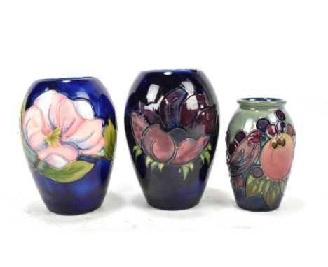 MOORCROFT; three ceramic vases to include a&nbsp;'Finches' pattern&nbsp;example, height 11cm, and a 'Magnolia' pattern&nbsp;e