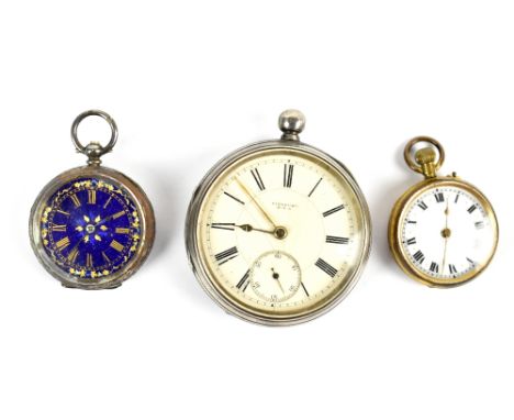 A circa 1900 silver open face pocket watch set with Roman numerals and subsidiary seconds dial, a fob watch with blue enamel 