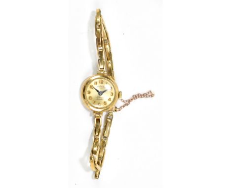 ROTARY; a lady's 9ct gold wristwatch, the circular face with Arabic numerals, with 9ct gold strap, approx 14.1g.