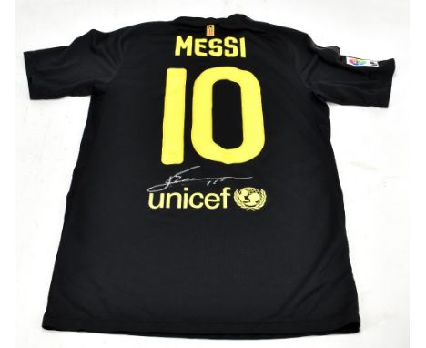 LIONEL MESSI; a replica signed Barcelona football shirt, size S.Additional InformationThe signature is genuine, there is no p