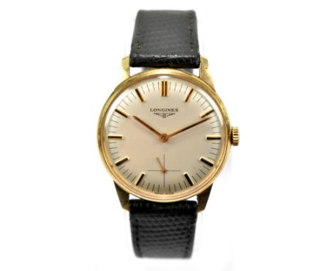 LONGINES; a gentleman's 1950s 9ct yellow gold cased wrist watch, the silvered dial set with baton numerals, and subsidiary se