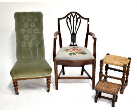 An early 20th century nursing chair, upholstered in green, with a Chippendale style armchair and two stools (4).