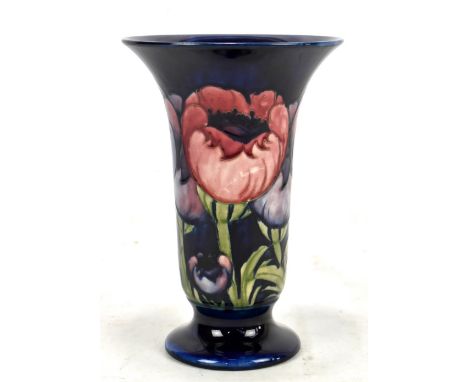 MOORCROFT; a trumpet vase decorated in the 'Big Poppy' pattern, blue signature and impressed marks to base, height 25.5cm.Add