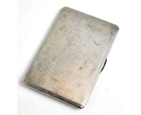 A George VI hallmarked silver cigarette case of rounded rectangular form with engine turned decoration, London 1947, length 1
