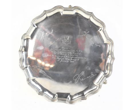 MAPPIN &amp; WEBB; a George VI hallmarked silver salver raised on three stepped hoof feet, with facsimile signatures and pres