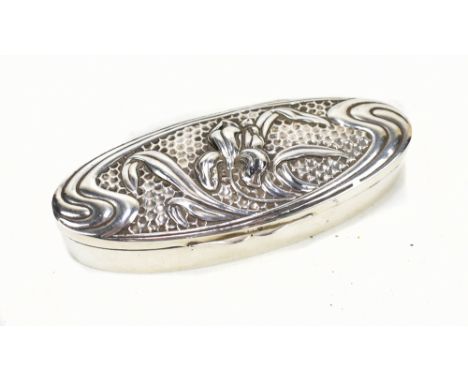 ROBERT CHANDLER; a Edward VII hallmarked silver Art Nouveau oval trinket box, the hinged lid with repoussé&nbsp;flower on hon