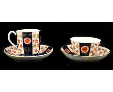 WORCESTER; an 18th century first period coffee can and saucer with matching tea bowl and saucer, both decorated in the 'Old J