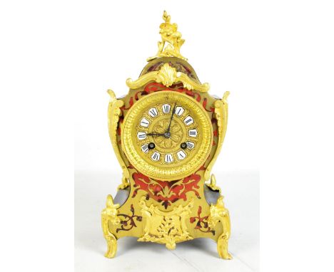 A late 19th century French boulle work mantel clock of typical form, the enamelled dial with Roman numerals, with French move