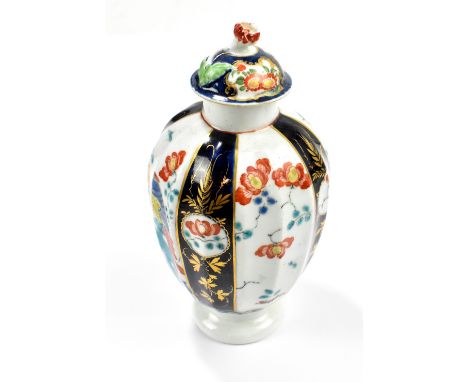 WORCESTER; an 18th century first period lobed tea caddy of baluster form, painted in the 'Joshua Reynolds' pattern, square pa