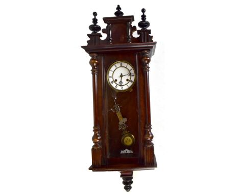 A 20th century stained mahogany Vienna wall clock, height 93cm.