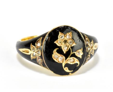 A Victorian black enamel and diamond mourning ring with flower decoration, size K, approx 4.8g (af).Additional InformationThe