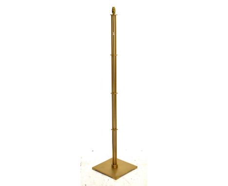 JIM LAWRENCE; a gilt painted metal standard lamp on square section base, height excluding fitment approx 141cm.