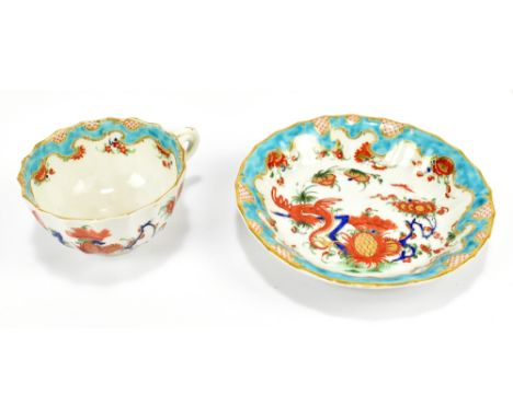 WORCESTER; an 18th century first period tea cup and saucer decorated in the 'Jabberwocky' pattern, with turquoise border and 