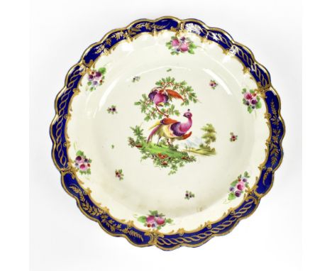WORCESTER; an 18th century dessert plate decorated with exotic birds to the central panel with floral sprays and gilt heighte