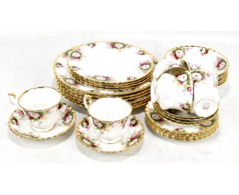 ROYAL ALBERT; a 'Celebration' pattern part dinner service comprising six plates, eight side plates (4+4), six bowls, six sauc