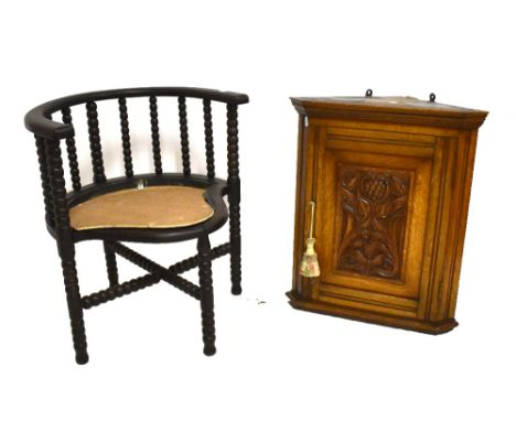 An oak corner cupboard and a bobbin turned chair with bow back (2).