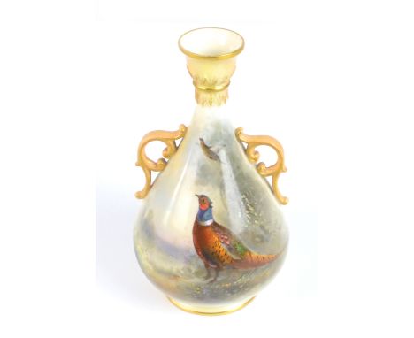 JAMES STINTON FOR ROYAL WORCESTER; a twin handled hand painted vase decorated with pheasants in landscape scene, green factor