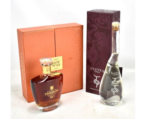COGNAC TESSERON; a single bottle of 'Lot No 65 Émotion XO' cognac (70cl) and single bottle of Uluvka vodka (70cl), both in pr