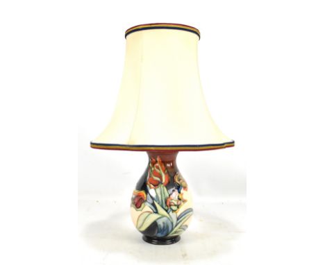 MOORCROFT; a 'Tulip' pattern table lamp of baluster form, impressed marks to base, height excluding fitment 18.5cm.Additional