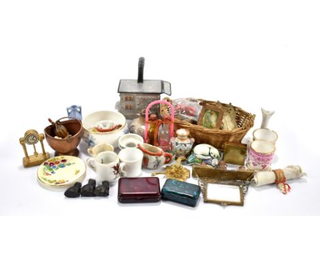 A collection of late early to mid-20th century dolls house ceramics and accessories including Royal Worcester dish, mugs, hen