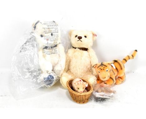 STEIFF; a 'Tigger', two bears, and two miniature bears, all boxed with various paperwork, length of two larger bears approx 3
