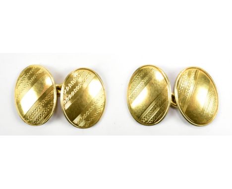 A pair of 18ct gold cufflinks, with engine turned decoration, approx 10.9g.