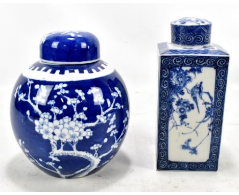 An early 20th century Japanese blue and white porcelain tea caddy and cover with floral decoration, bears signature to body, 