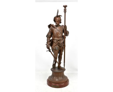 An early 20th century bronzed spelter figural table lamp 'Mephisto', raised on circular plinth base, height 77cm.Additional I