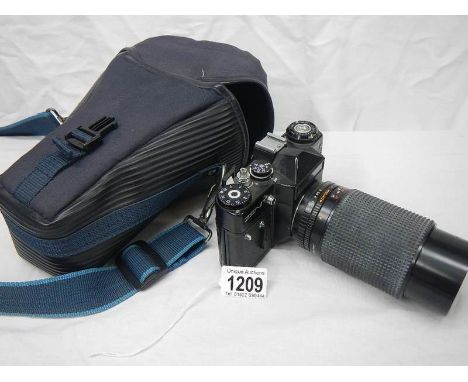 A cased Zenit camera.