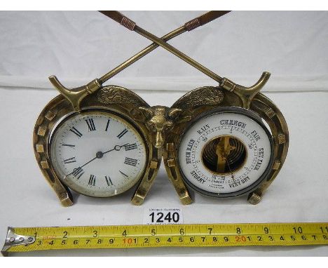 A good early 20th century brass horse shoe clock/barometer, barometer missing glass.