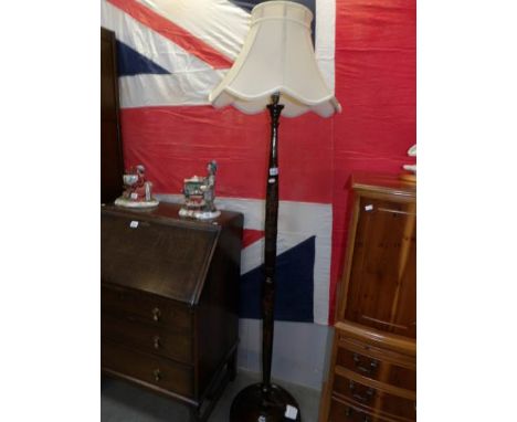 A 1930's floor standing lamp with oriental carving. (collect only)