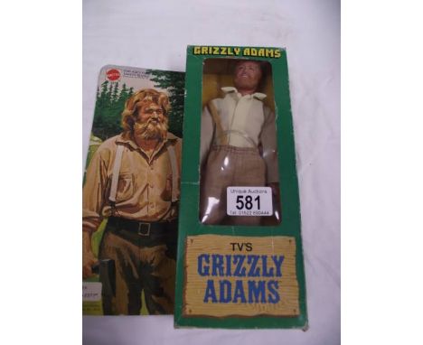 A boxed Mattel Grizzly Adams action figurine.