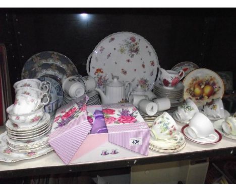 A shelf of tea ware including Royal Doulton trio, Royal Albert part tea set etc.,