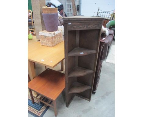 A corner shelf unit and a coffee table