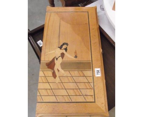 An erotic inlaid backgammon board.