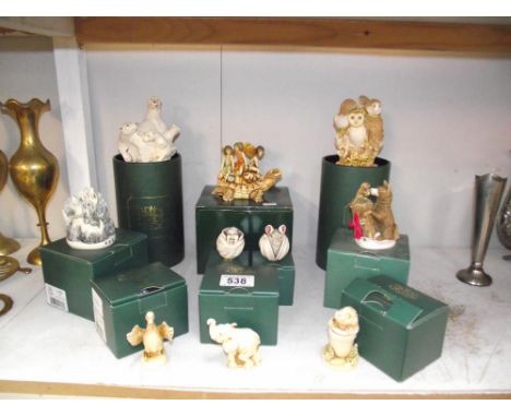 A quantity of boxed and unboxed Harmony Kingdom treasure chests, netsuke etc.,