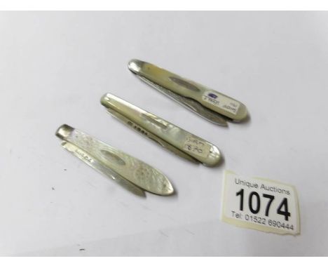 3 silver and mother of pearl pocket knives, Sheffield 1911, Birmingham 1870 and one other.