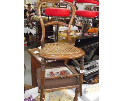 A bergere panelled hall chair and a tapestry covered stool (collect only).