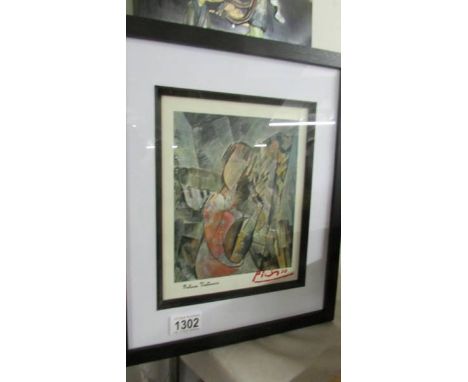 A framed and glazed Picasso print from galerie Vallouris, signed on print and signed in red crayon on mount.