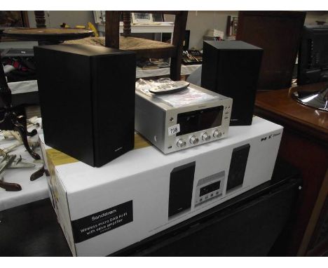 A boxed Sondstrom wireless micro dab hi fi with wave amplifier (appears unused). 