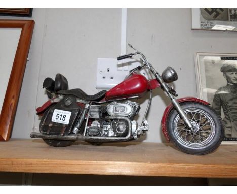 A large pressed metal model of a Harley Davidson/Indian motorcycle.