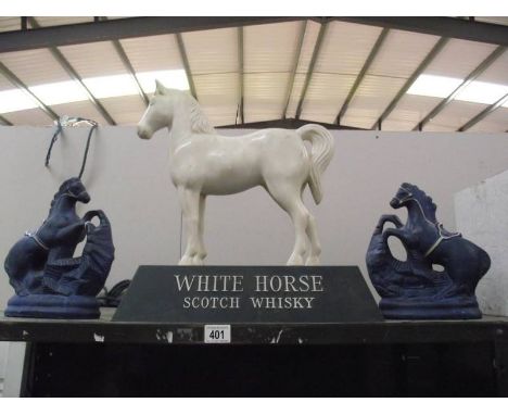 A large plastic White Horse Scotch Whisky  horse a/f and 2 blue pottery horses, 1 a/f.
