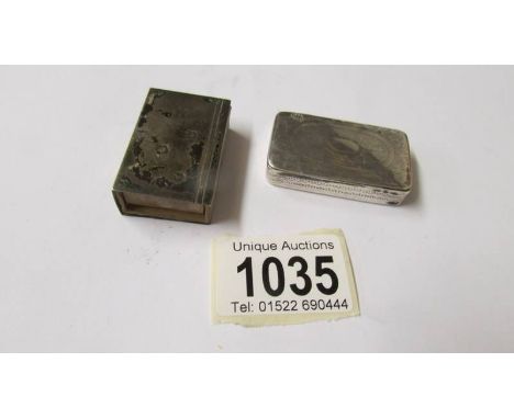 A silver matchbox holder and a silver snuff box.  34.4 grams.