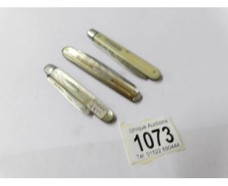 3 silver and mother of pearl pocket knives, Sheffield 1885, Chester 1890 and one other.