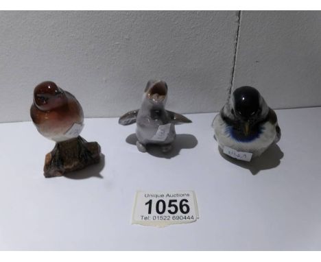 A Beswick robin, a Goebel tit and a Danish bird.