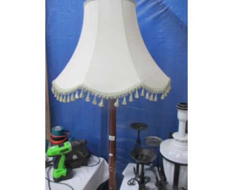 A standard lamp and shade